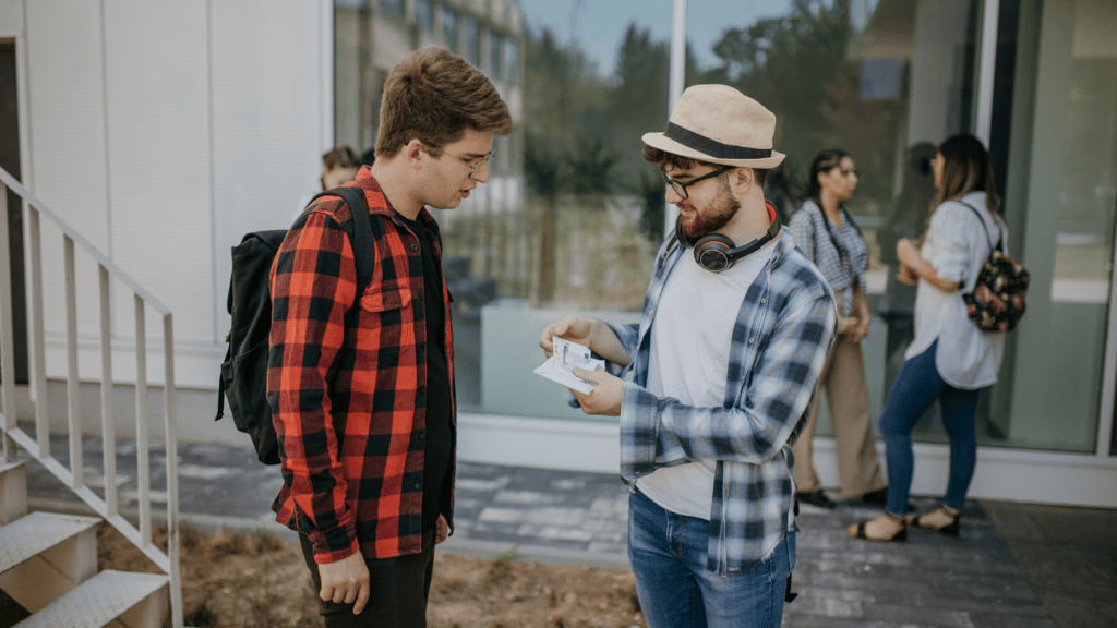 Man lending his friend money